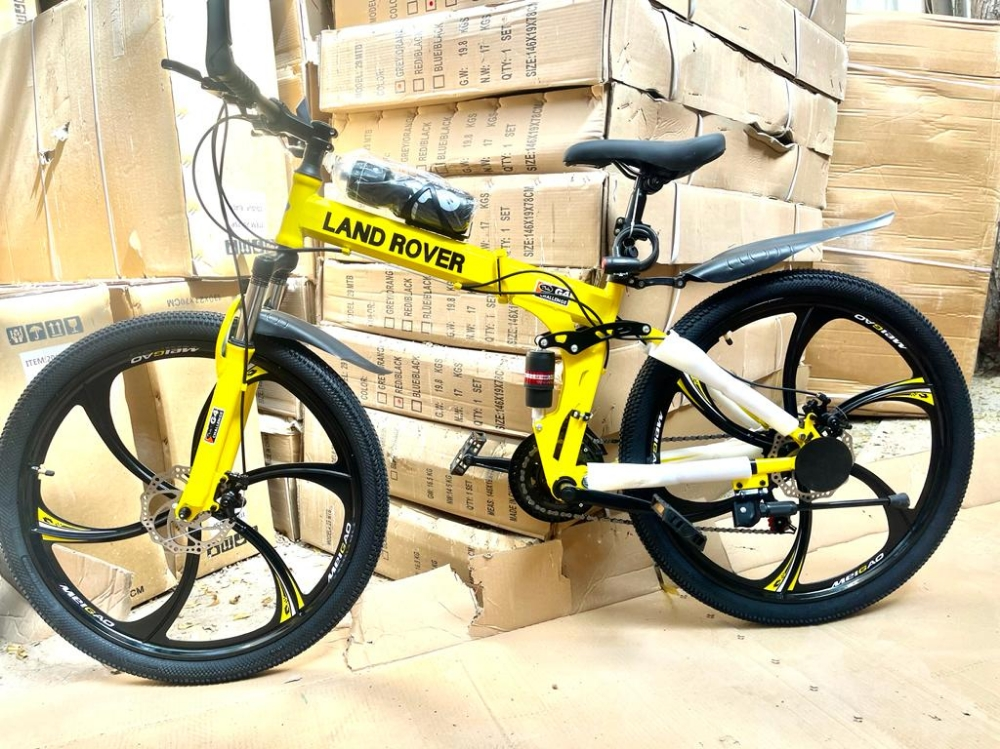 land rover bicycle yellow